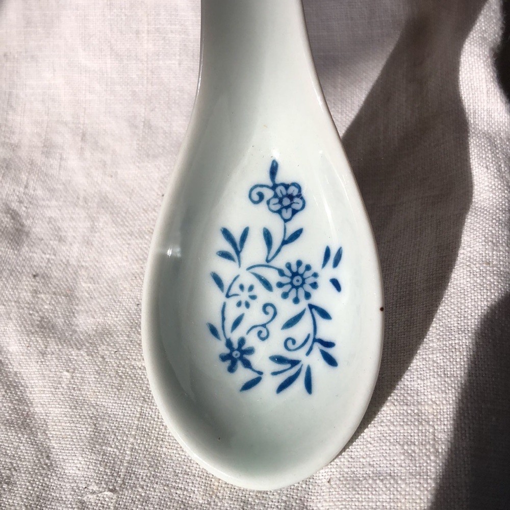 White with blue floral soup spoon